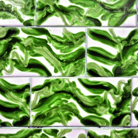 Coloured tiles wall useful as a backgroundの写真素材