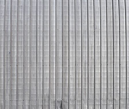Corrugated steel plate useful as a backgroundの写真素材