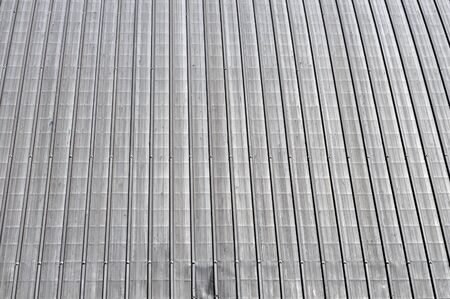 Corrugated steel plate useful as a backgroundの写真素材