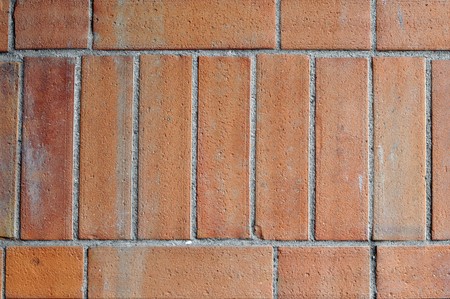Red brick wall useful as a backgroundの写真素材