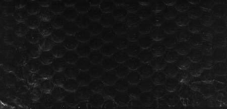 Bubble wrap sheet useful as a backgroundの写真素材