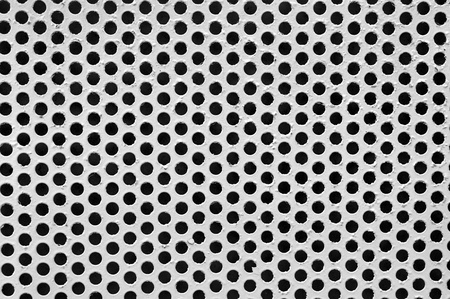 Steel grid mesh useful as a backgroundの写真素材