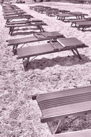 Shore or beach with sun umbrella and or deckchairs - high dynamic range HDRの写真素材