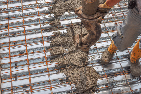 Detail of construction works in a building site with reinforced concreteの写真素材