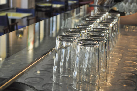 Empty pint glasses in a bar
