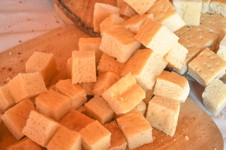 Many sliced pizza bread cubes snack food