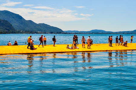 LAKE ISEO, ITALY - CIRCA JUNE 2016: High_dynamic_range (HDR) The Floating Piers site specific artwork by Christo and Jeanne Claudeのeditorial素材