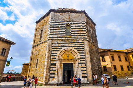 VOLTERRA, ITALY - CIRCA AUGUST 2016: High_dynamic_range (HDR) Baptistry at Duomo di Volterra cathedral (aka Cattedrale di Santa Maria Assunta)のeditorial素材