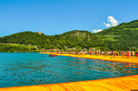 LAKE ISEO, ITALY - CIRCA JUNE 2016: High_dynamic_range (HDR) The Floating Piers site specific artwork by Christo and Jeanne Claudeのeditorial素材