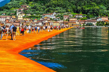 LAKE ISEO, ITALY - CIRCA JUNE 2016: High_dynamic_range (HDR) The Floating Piers site specific artwork by Christo and Jeanne Claudeのeditorial素材