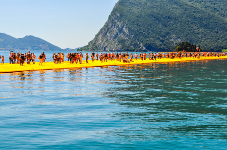 LAKE ISEO, ITALY - CIRCA JUNE 2016: High_dynamic_range (HDR) The Floating Piers site specific artwork by Christo and Jeanne Claudeのeditorial素材