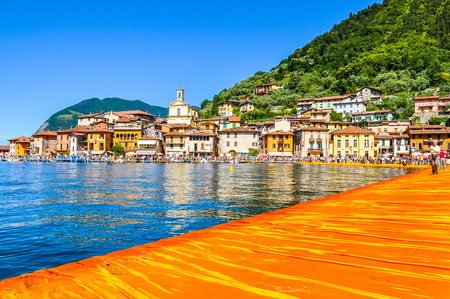 LAKE ISEO, ITALY - CIRCA JUNE 2016: High_dynamic_range (HDR) The Floating Piers site specific artwork by Christo and Jeanne Claudeのeditorial素材
