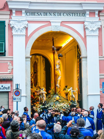 SAVONA, ITALY - APRIL 18, 2014: High_dynamic_range (HDR) People attending the Good Friday procession
