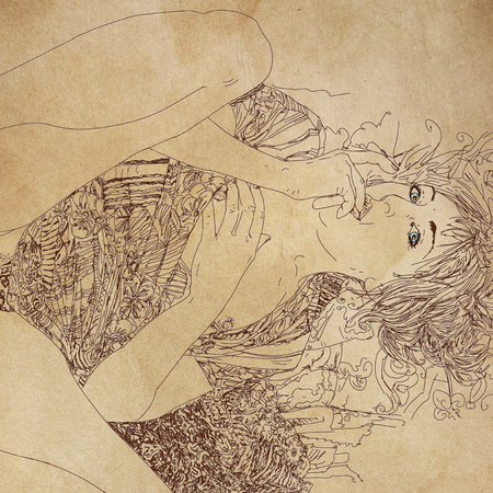 sexy and erotic woman lying on bed with flower dressingの写真素材