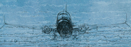 an airplane flying through the cloudsの写真素材