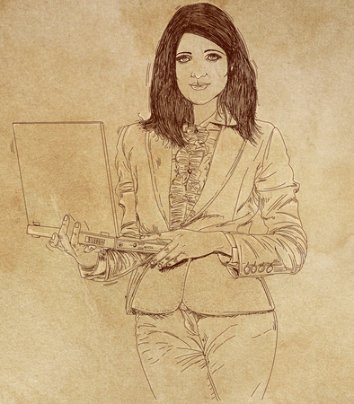 Young woman with sketch padの写真素材