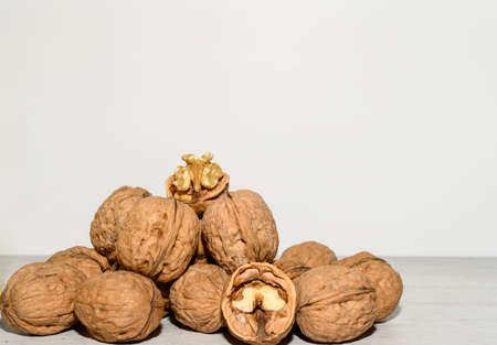 Lots of walnuts, some peeled. Close up viewの写真素材