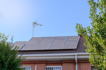 Solar panels on the roof of a house. Concept of renewable energy