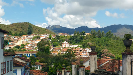 March 25, 2016, Historic city of Ouro Preto, Minas Gerais, Brazil, view of the city with Chapel of Our Lady of Sorrows and Pico Itacolomi in the background.のeditorial素材