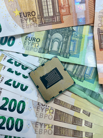 Close-up of CPU microprocessor on Euro banknotes. 50 EURO 200 EURO