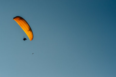 A person kiteboarding in a summer dayの写真素材