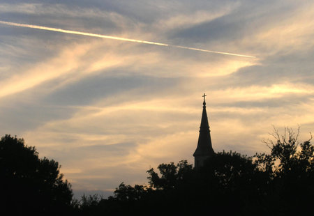 Old church over sunsetの写真素材