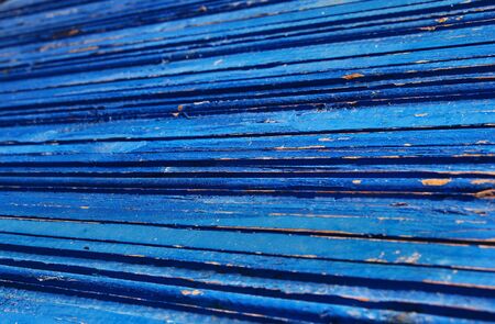 Weathered old blue  wooden fenceの写真素材