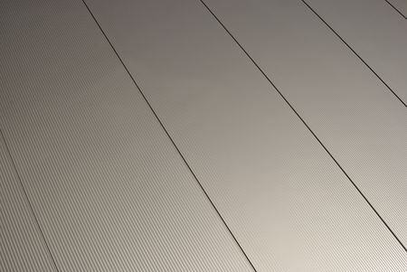 Shiny metal wall of buildingの写真素材