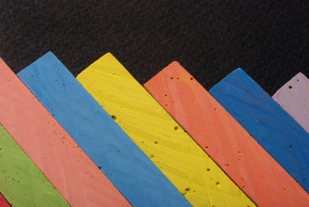 Heap of colorful chalks in close up