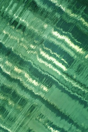 Abstract green background - reflection on waterの写真素材