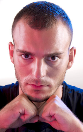 Studio shoot of young caucasian angry man