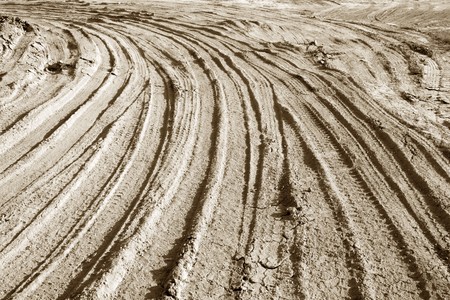 Tire tracks on the ground, in rural areaの写真素材