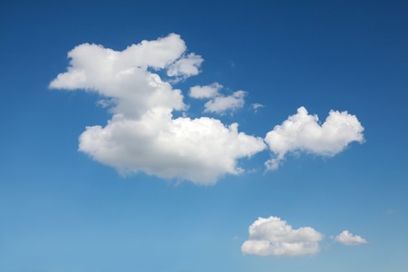 White clouds on blue sky suitable for backgroundsの写真素材