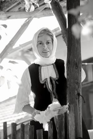 Woman dressed in antique Bulgarian folk costume hand embroidered shoot in South-east Serbia near to Pirotの写真素材