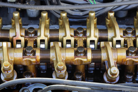 Close up of parts in engine head three valve per cylinder  system