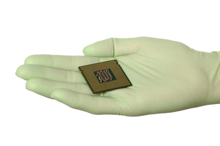 Human hand in glove holding computer chip, micro processor, isolated on white