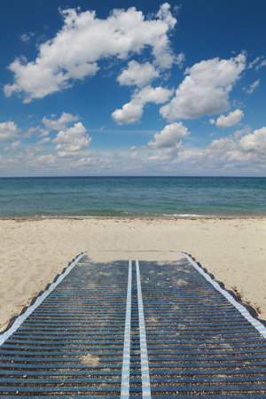 Walk path to sand beach with beautiful sky, Greeceの写真素材