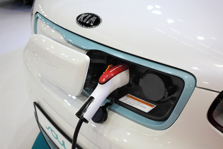 Belgrade, Serbia - March 31, 2017: KIA Soul Ev electric vehicle charging, presented at 53th International Motor Show Belgrade Serbiaのeditorial素材