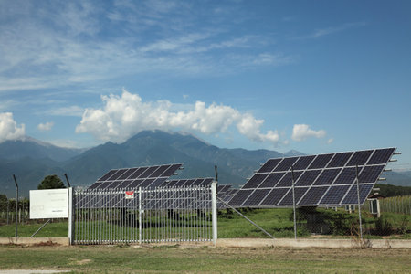 KATERINI, GREECE - JULY 26. 2017, Solar power plant side a road from Litochoro to Katerini with Olympus mountin in background, Era-energy Litochoro July  26. 2017. Olympus region, Macedonia, Greeceのeditorial素材