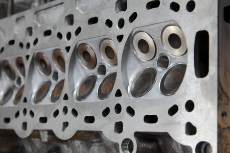 Service of car engine cylinder head, four valve construction