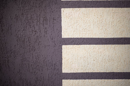 Decorative plaster on the wall. Geometric pattern. Rectangles. Backgrounds and textures.の写真素材