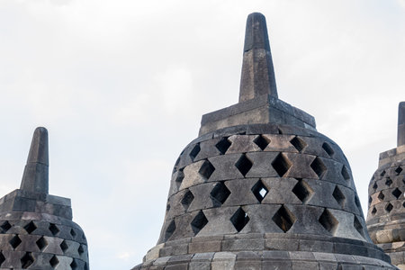 Stone Carved Ancient Stupa Detail at Borobudur Temple Indonesia Landmark