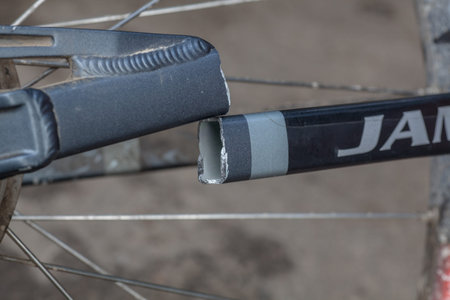 Chekhov, Moscow Region, Russia - August 30, 2009: The broken frame of mountain bike. Model - Jamis Dakar Sport 2006. The back part of bike with the chain stay broken. Jamis Bicycles is an American compain, they design bikes.のeditorial素材