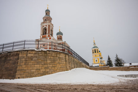 Two churches in winter on the hillの写真素材