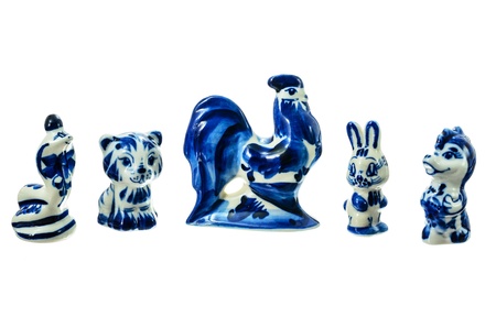 Porcelain figurines of animals on a white background.の写真素材