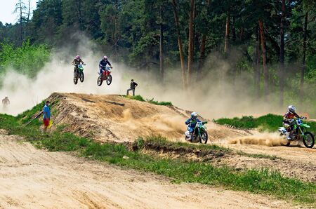 LYTKARINO, MOSCOW REGION, RUSSIA - 18 MAY 2013: motocross cup motor club "Forsazh". On the track athletes at number 43 Knyaginin Alexander, 470 Rogov Vladimir, 117 Suchkov Yuri, 44 Knyaginin Victor.のeditorial素材