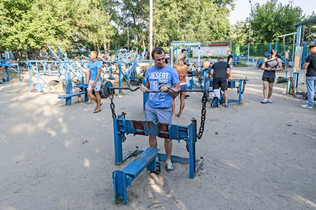 KIEV, UKRAINE - AUGUST 6: Athletes train at Hydropark in the event travel to Kiev, August 6, 2013.