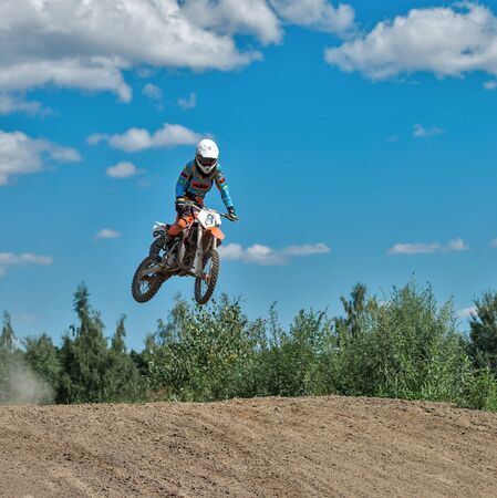 Ramenskoye, Russia - July 20, 2014: Riders pass route in action during motorcross motor club Forsazh event in Ramenskoye district, Moscow region.のeditorial素材