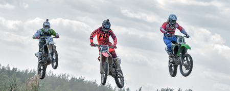 Ramenskoye, Russia - July 20, 2014: Riders pass route in action during motorcross motor club Forsazh event in Ramenskoye district, Moscow region.のeditorial素材