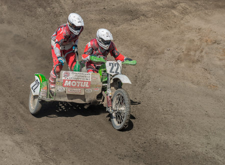 Ramenskoye, Russia - July 20, 2014: Riders pass route in action during motorcross motor club Forsazh event in Ramenskoye district, Moscow region.のeditorial素材